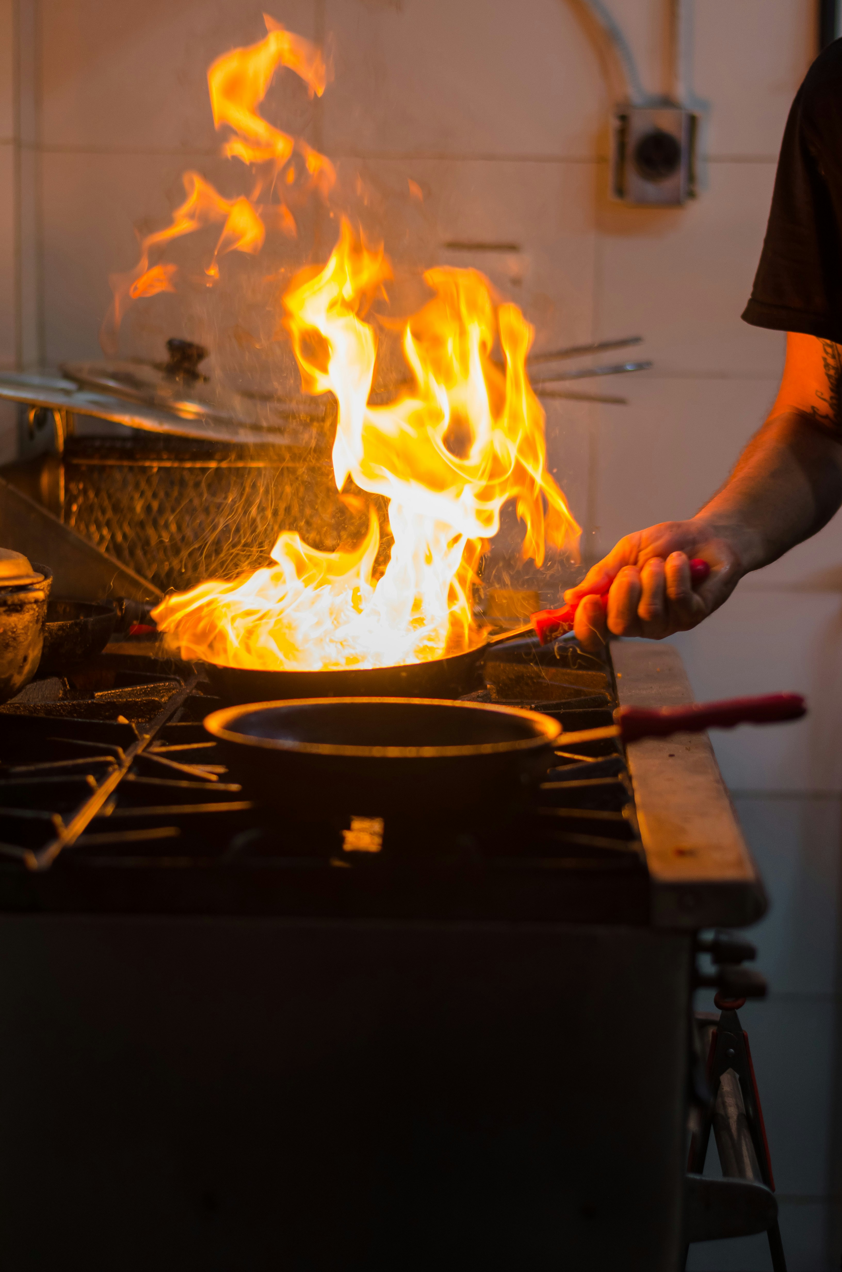 Burnt pan on stove with smoke