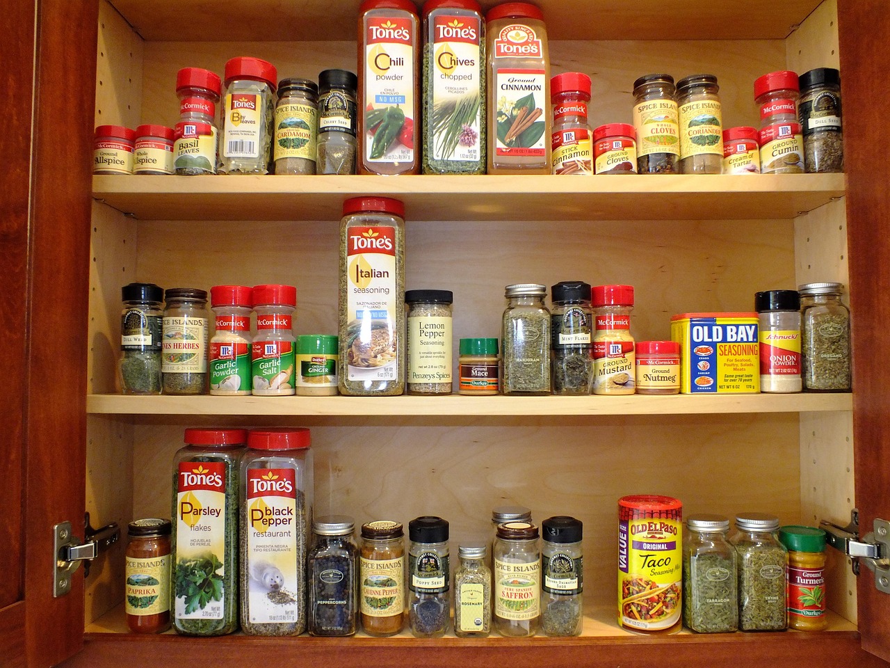 Organized spice rack with labeled jars